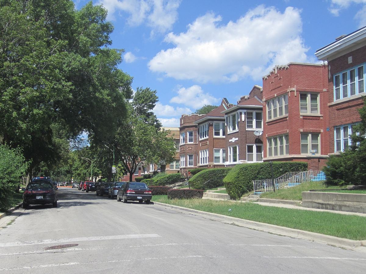 Row of early twentieth century brick two-flat apartment buildings in Auburn Gresham, Chicago