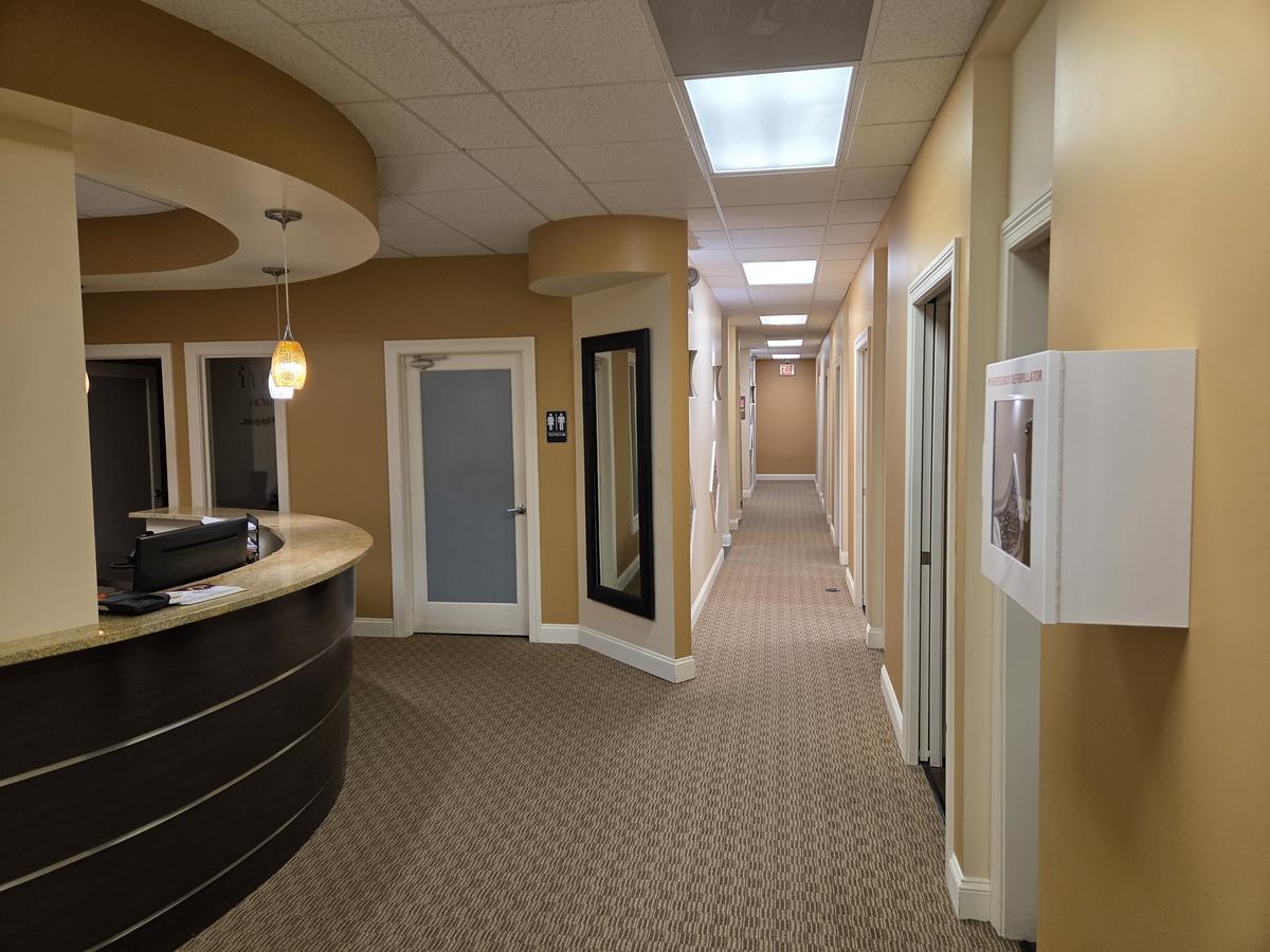 Hallway leading from reception to the treatment rooms at Comfort Family Dental