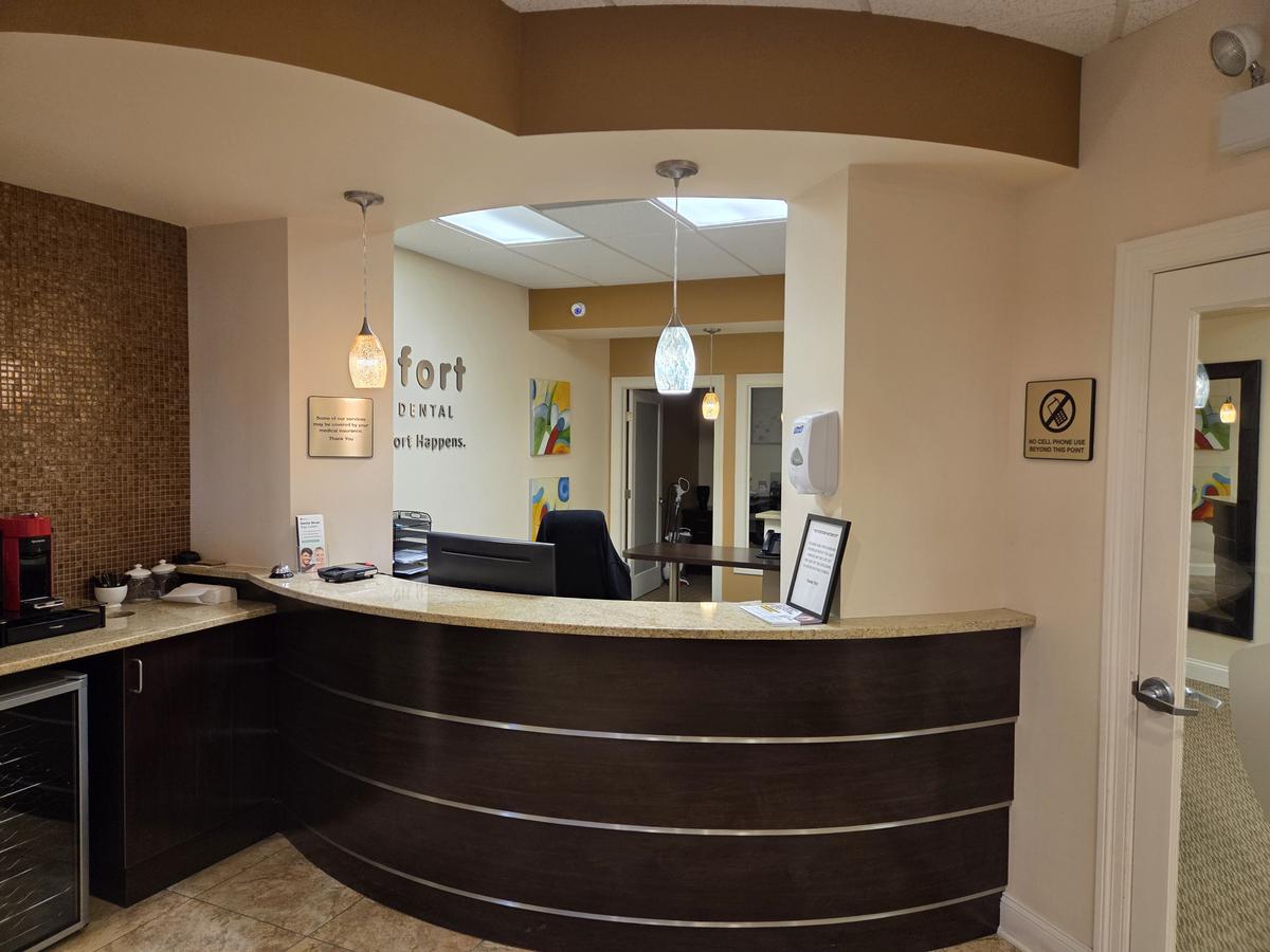 Reception area and complimentary coffee station at Comfort Family Dental